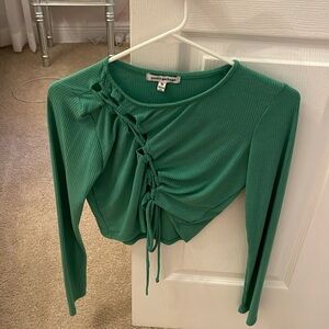 long sleeve green cutout top
size M